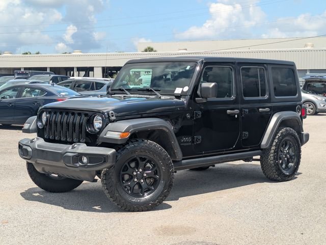 Used 2022 Black Jeep Unlimited Willys image 1