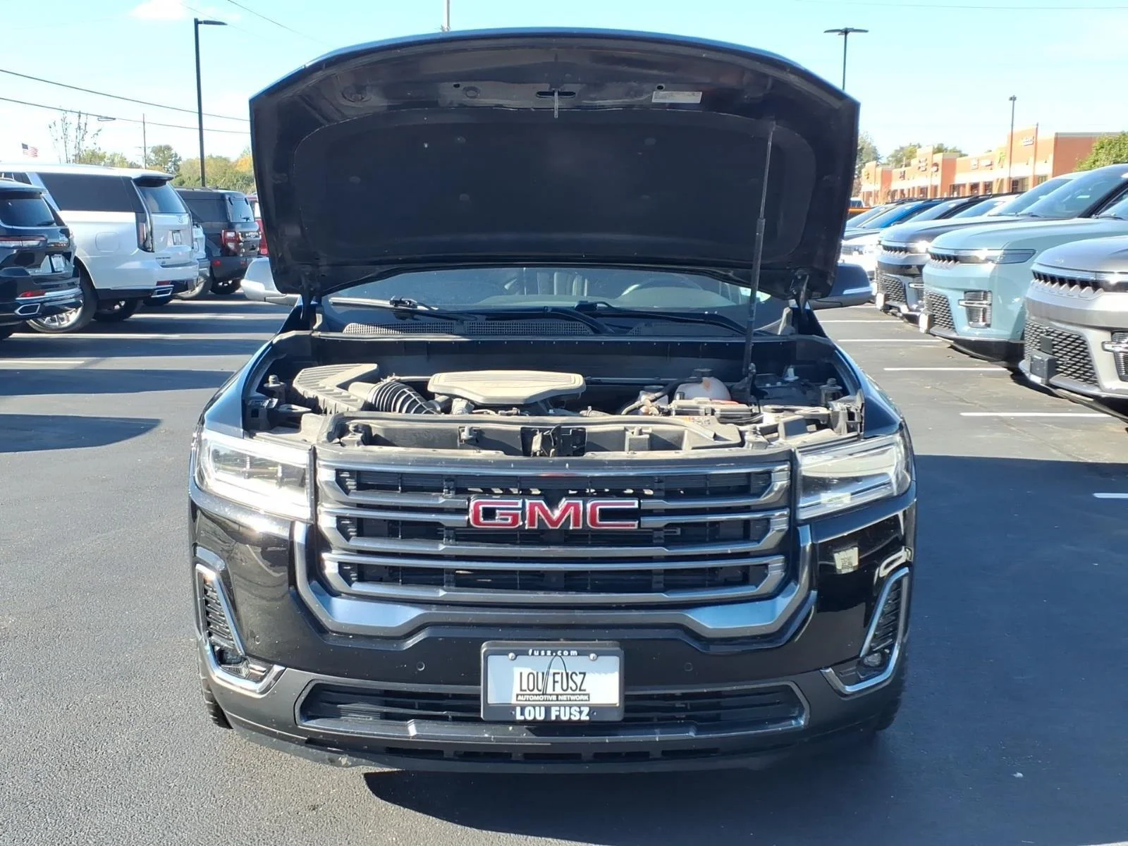 Used 2023 Ebony Twilight Metallic GMC AT4 image 34
