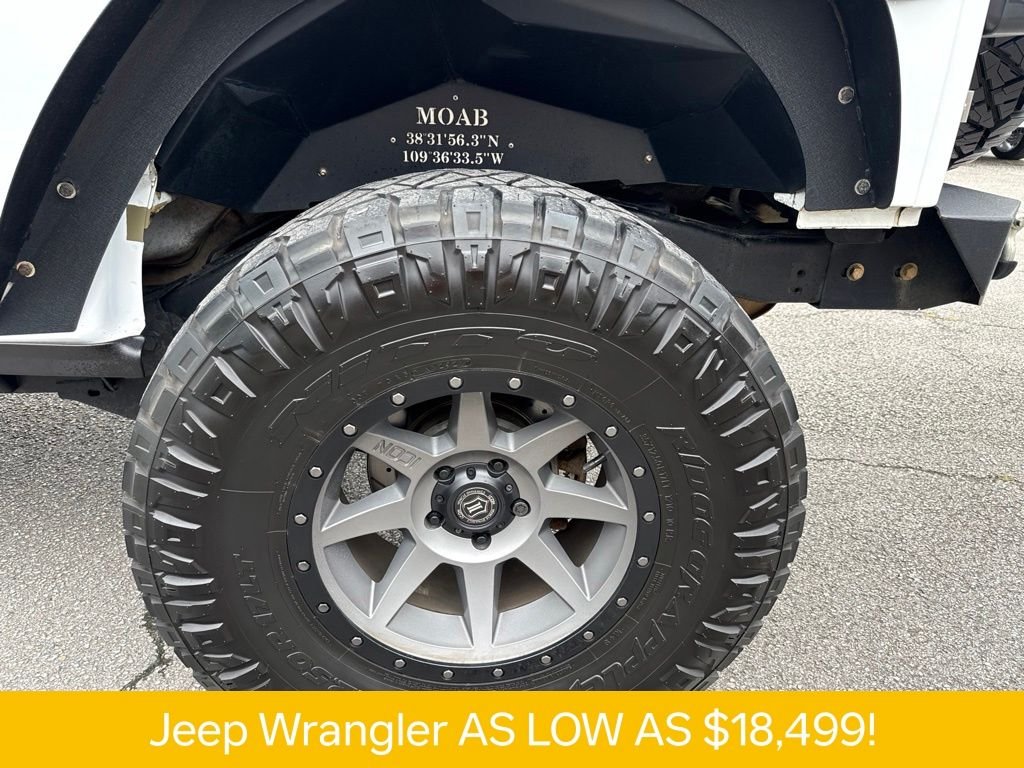 Used 2016 White Jeep Unlimited Sport image 32