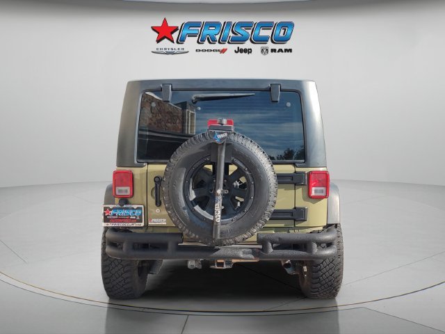 Used 2013 Green Jeep Unlimited Sport image 6