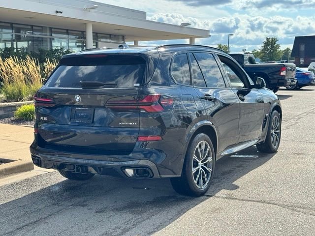 Certified Used 2024 Black Sapphire Metallic BMW xDrive40i image 3