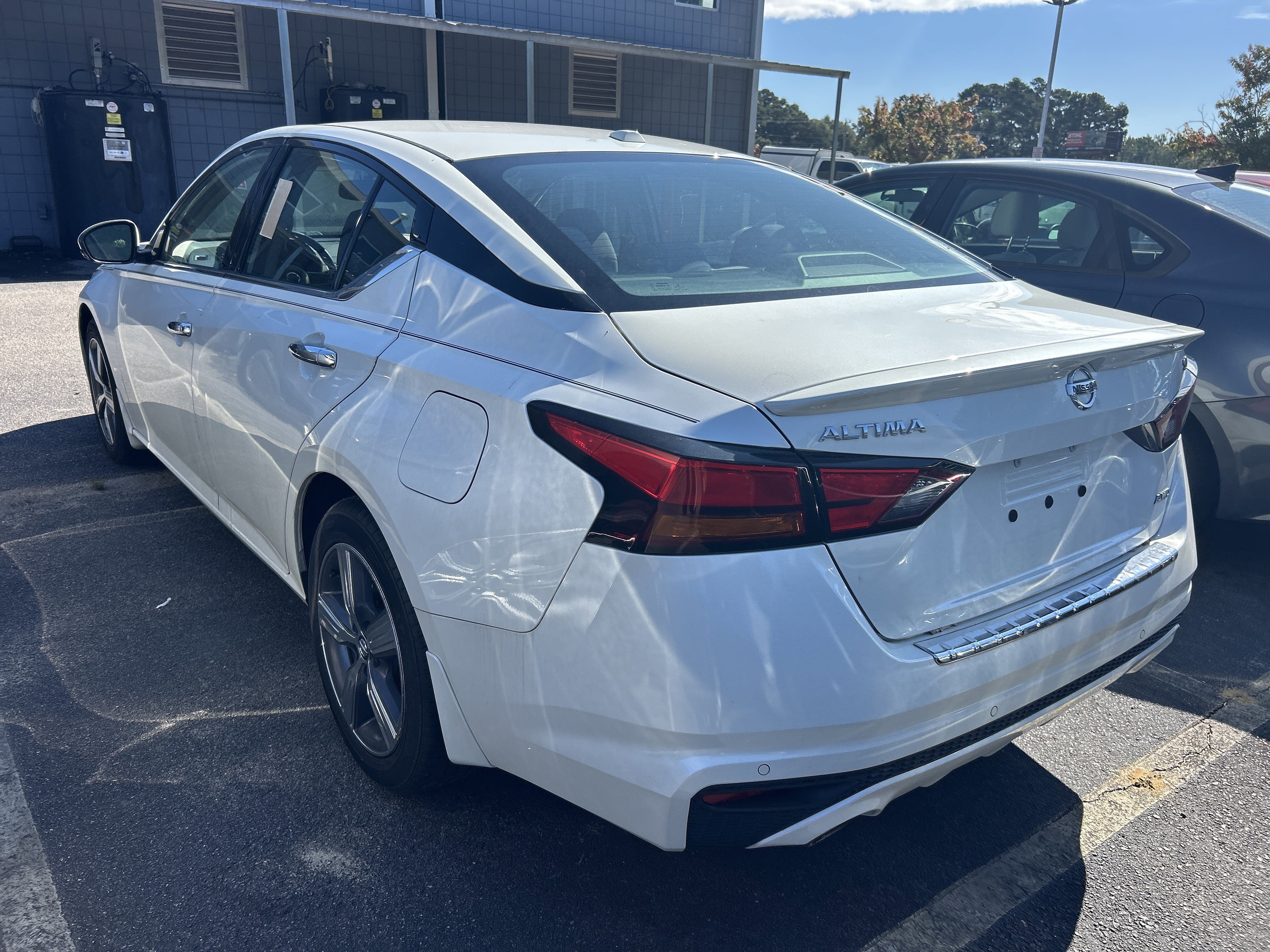 Used 2019 Pearl White Tricoat Nissan  image 2