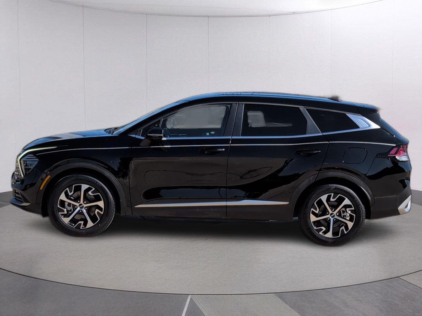 Used 2024 Ebony Black Kia EX image 2