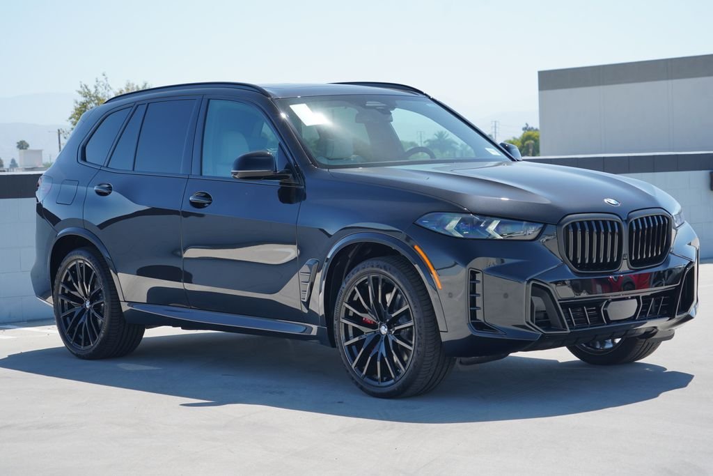New 2026 Black Sapphire Metallic BMW sDrive40i image 3