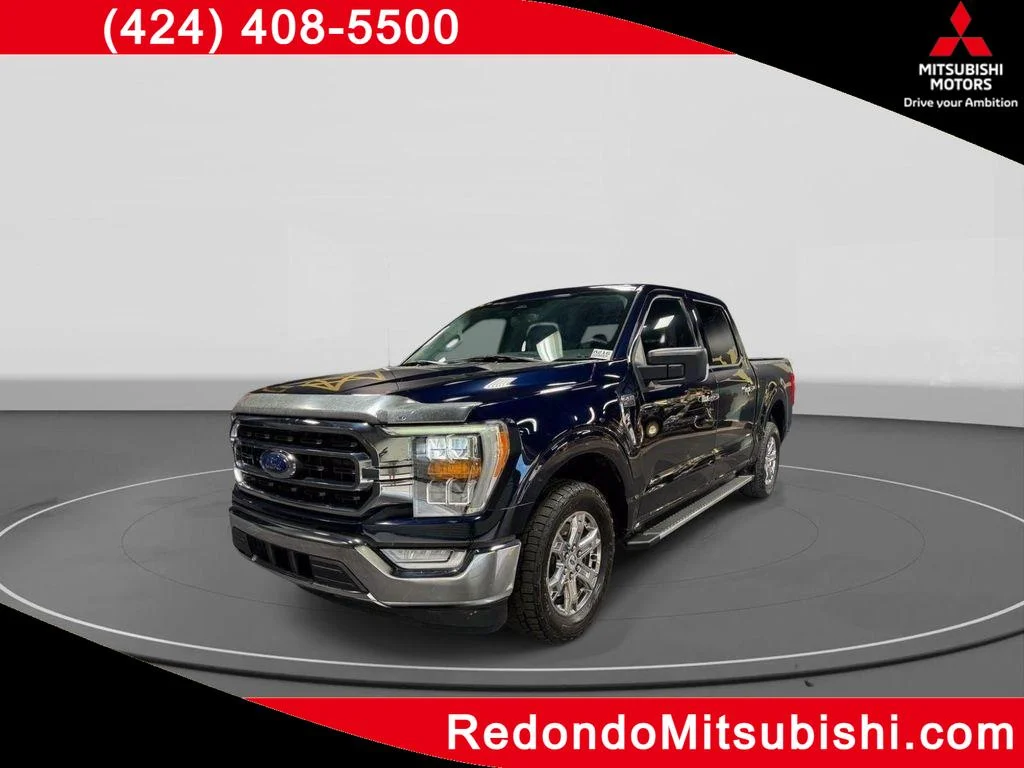 Used 2022 Antimatter Blue Metallic Ford XLT image 1