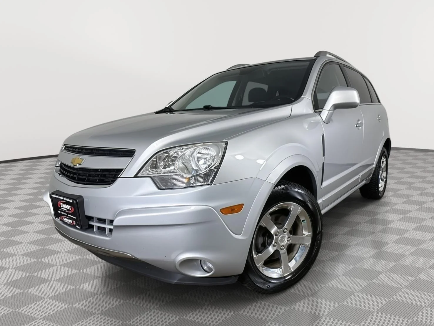 Used 2012 Silver Ice Metallic Chevrolet LTZ image 1