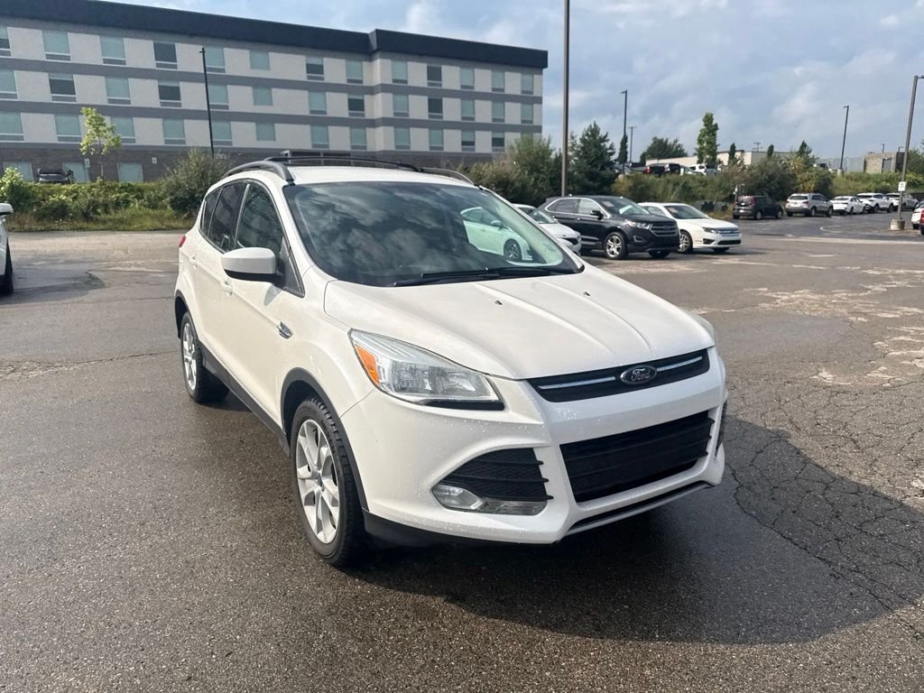 Used 2013 White Platinum Ford SE image 8