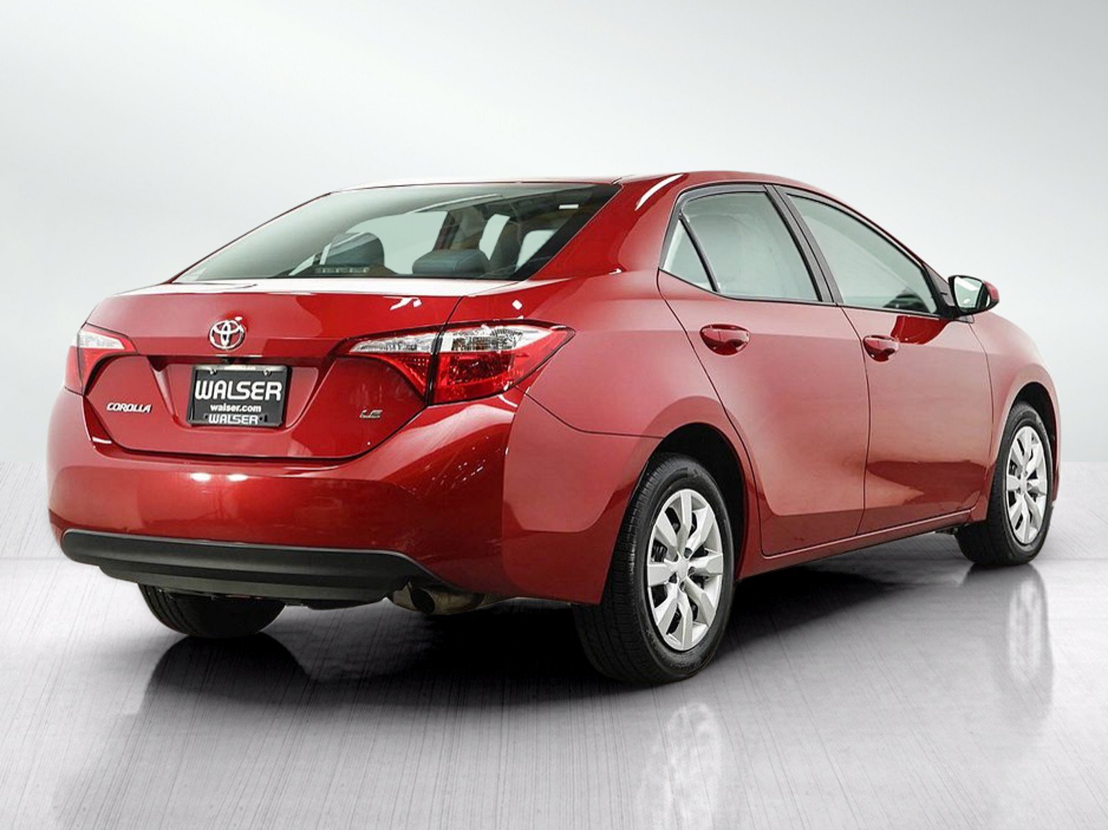 Used 2016 Barcelona Red Metallic Toyota LE image 5