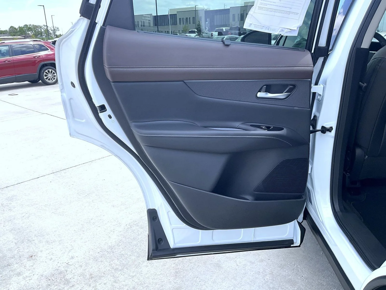 Certified Used 2025 White Nissan Platinum image 18