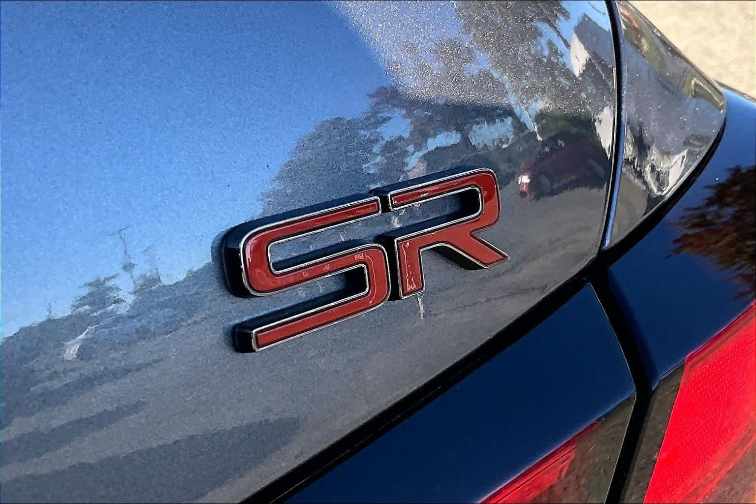Used 2025 Garnet Pearl Metallic Nissan SV image 10