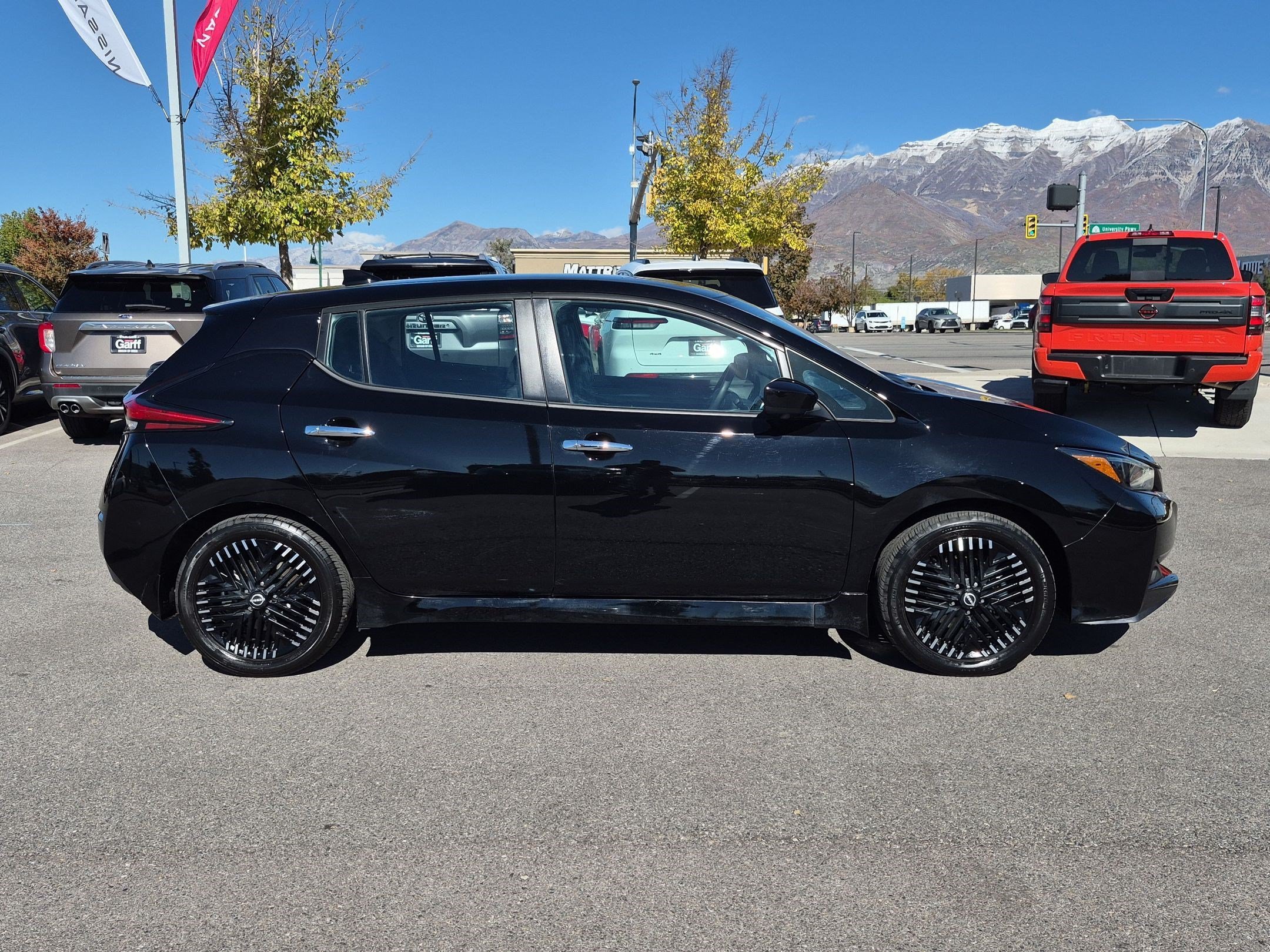Used 2025 Super Black Nissan SV PLUS image 2