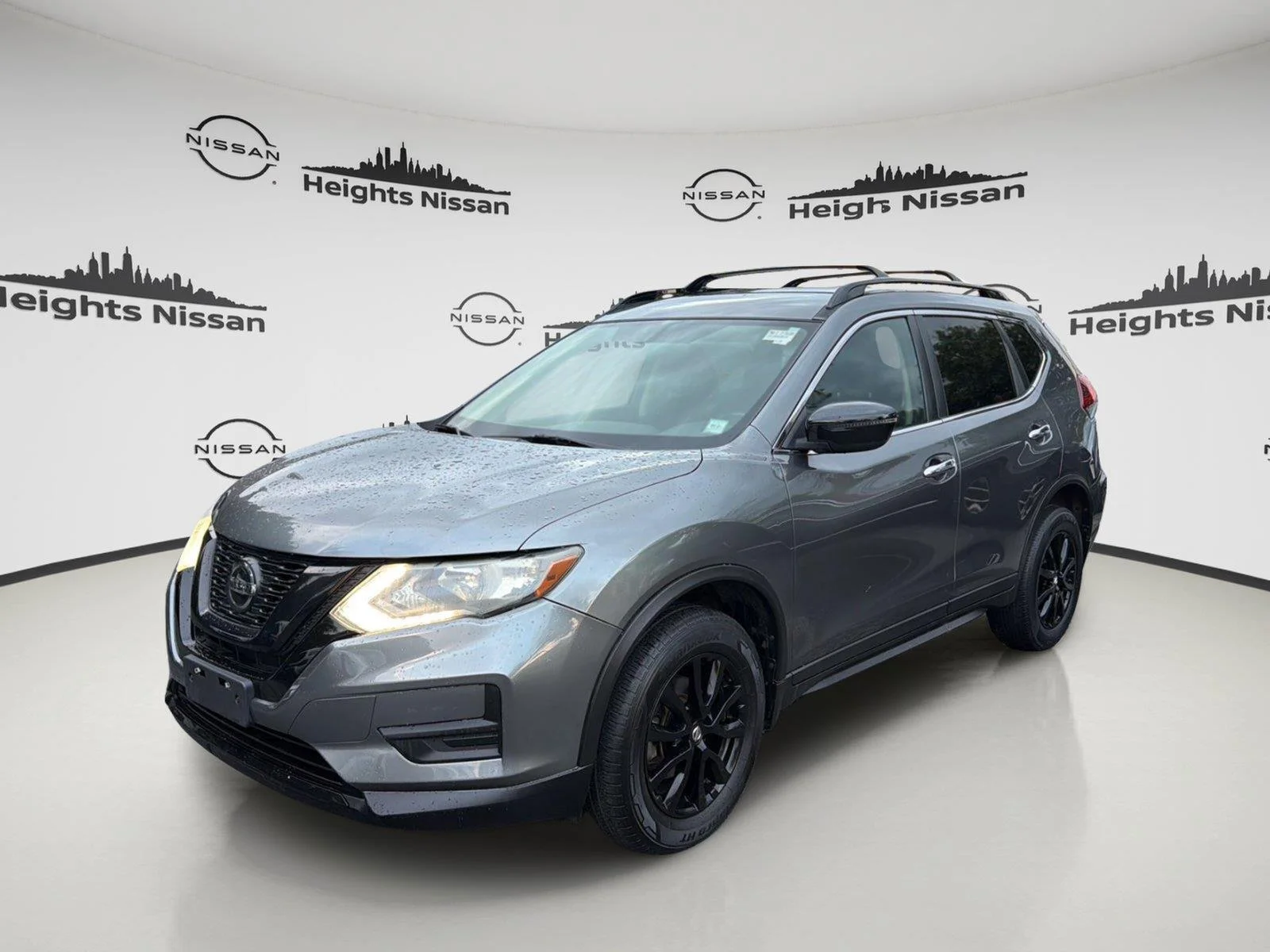 Used 2018 Gun Metallic Nissan SV image 1