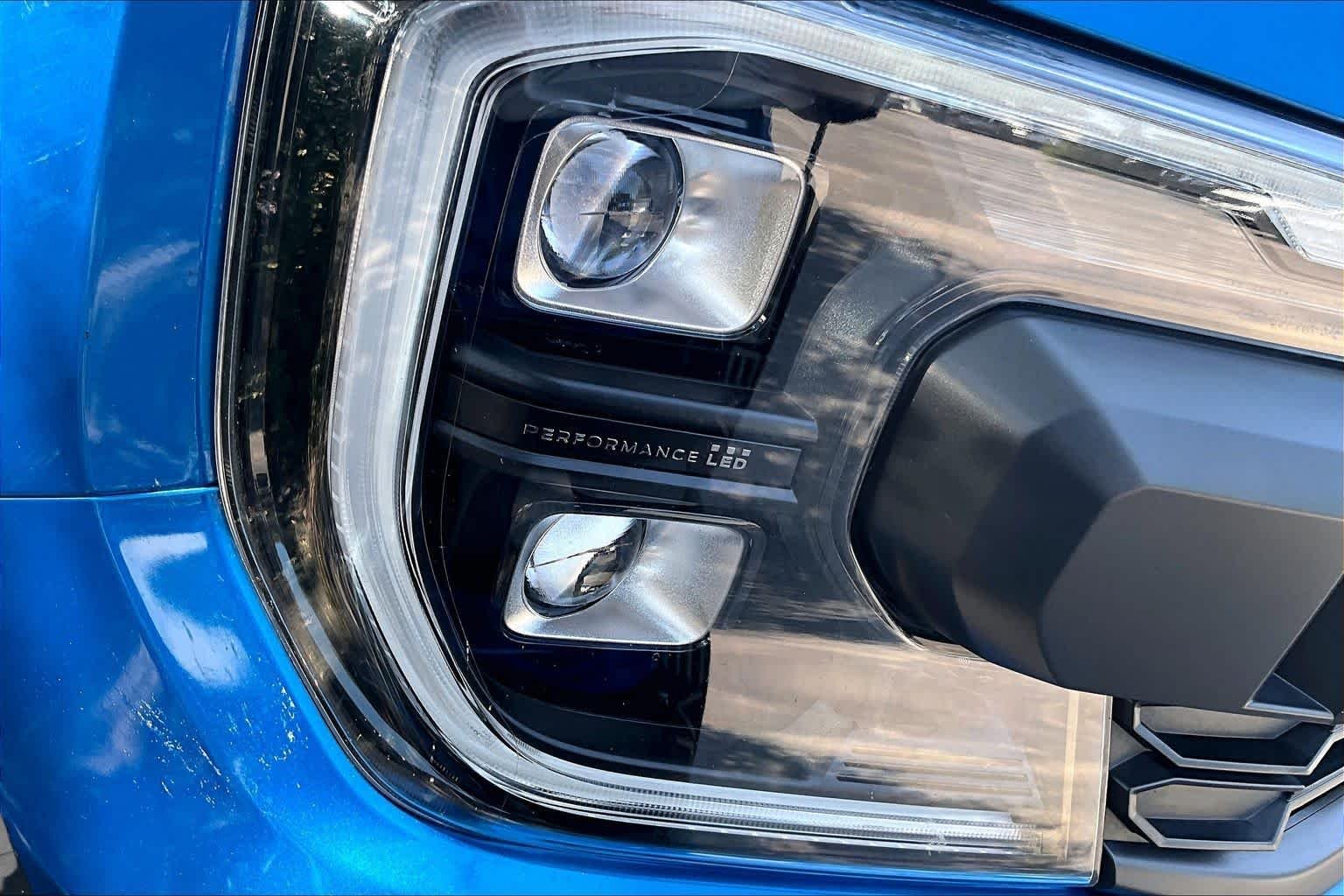 Used 2024 Velocity Blue Metallic Ford Raptor image 28