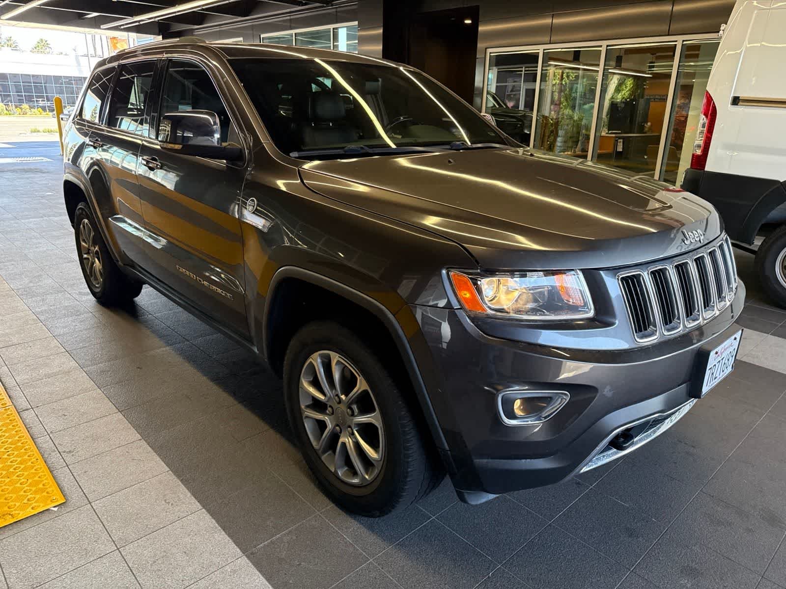 Used 2016 Granite Crystal Metallic Clearcoat Jeep Limited image 6
