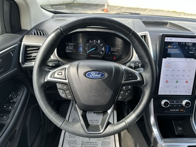 Used 2024 Blue Ford Titanium image 13