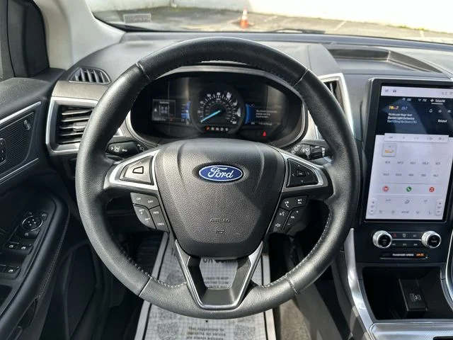 Certified Used 2024 Blue Ford Titanium image 13
