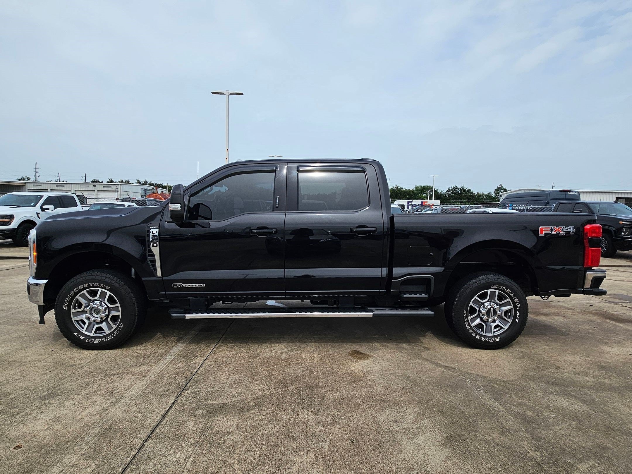 Used 2023 Black Metallic Ford Lariat image 6