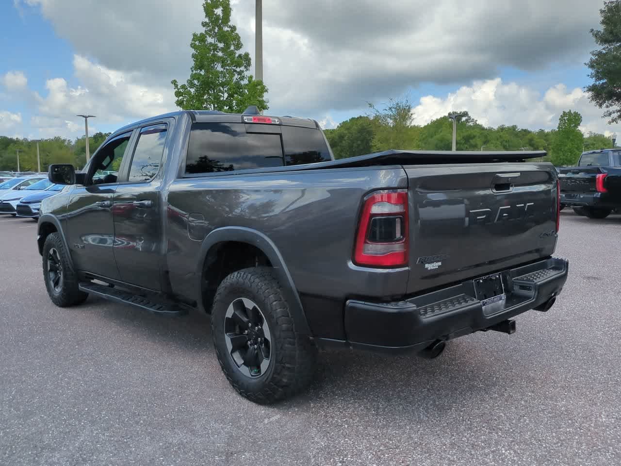 Used 2019 Granite Crystal Metallic Clearcoat Ram Rebel image 4
