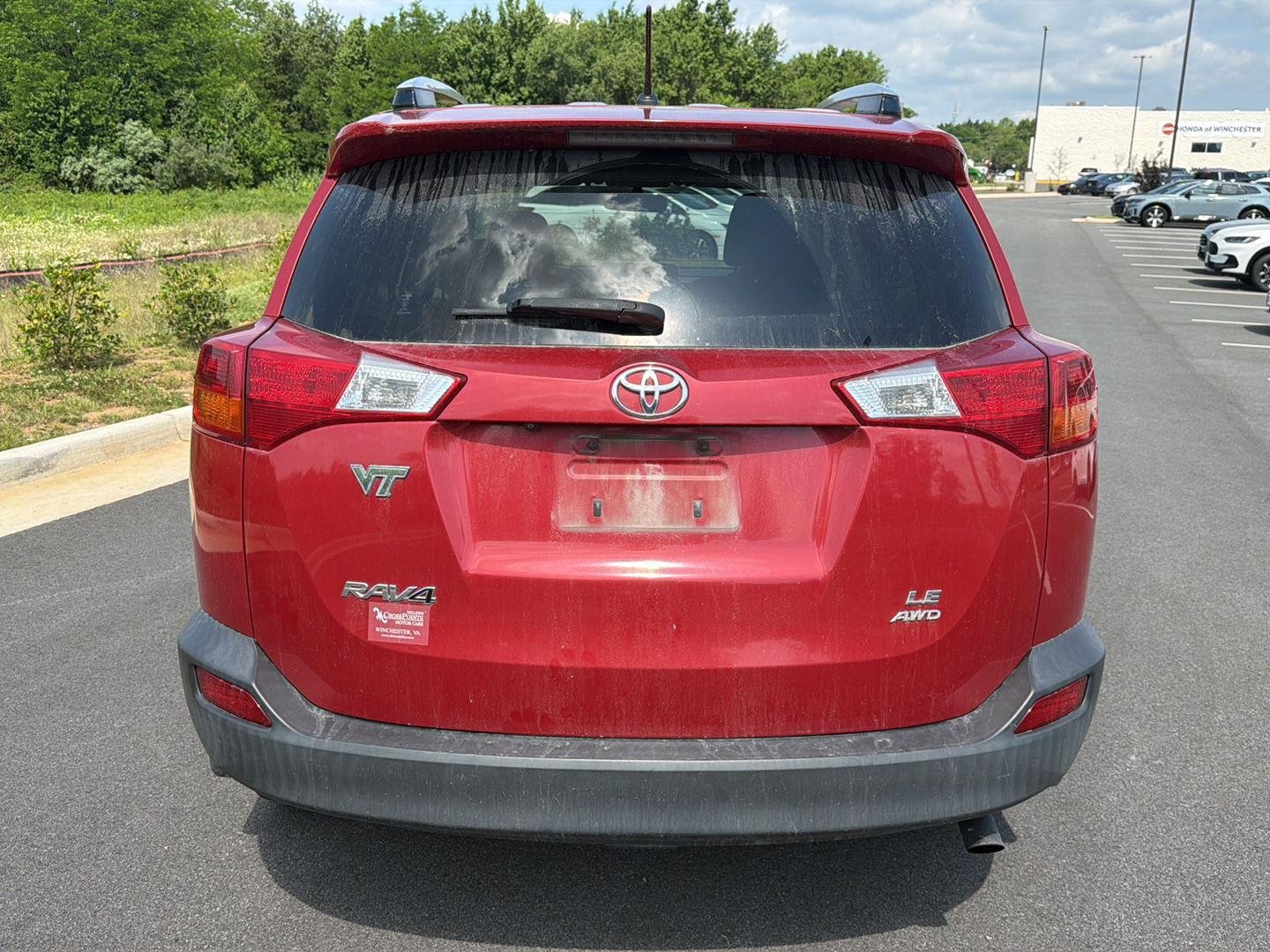 Used 2013 Barcelona Red Metallic Toyota LE image 2