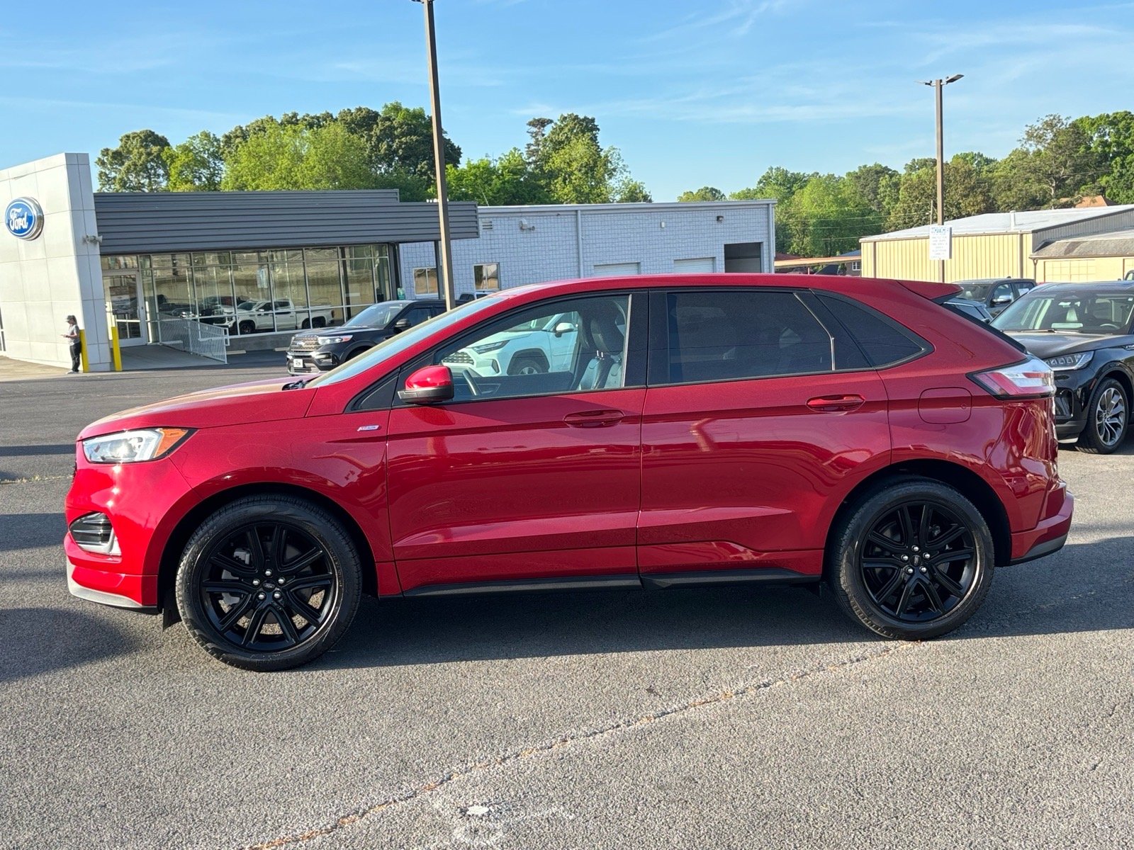 Used 2023 Rapid Red Metallic Tinted Clearcoat Ford ST-Line image 4