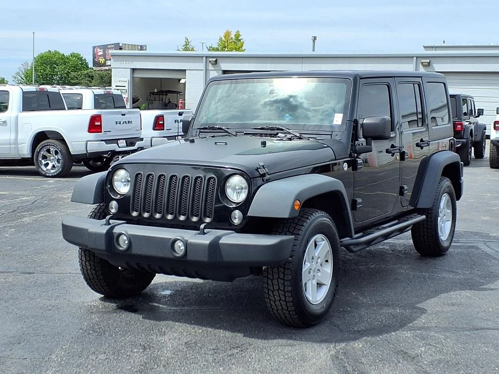 Used 2014 Jeep Wrangler Unlimited Sport with VIN 1C4BJWDG3EL252931 for sale in Kansas City