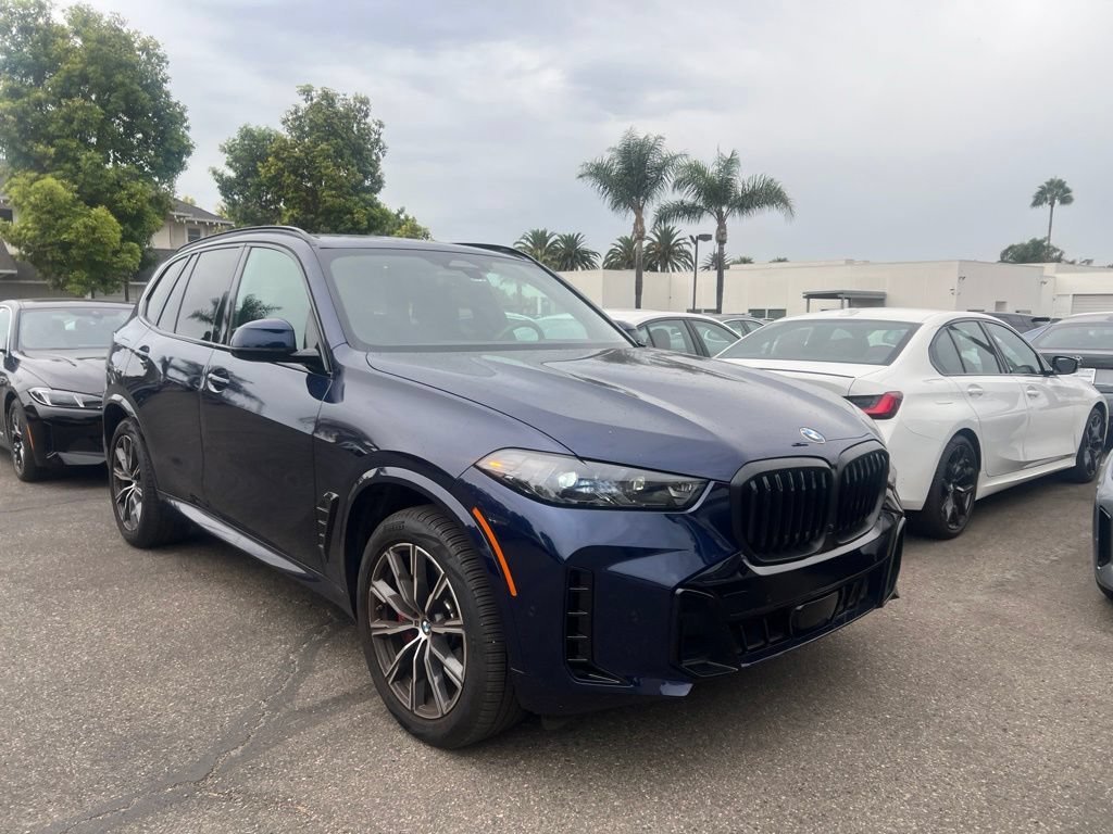 Used 2024 Tanzanite Blue II Metallic BMW sDrive40i image 3