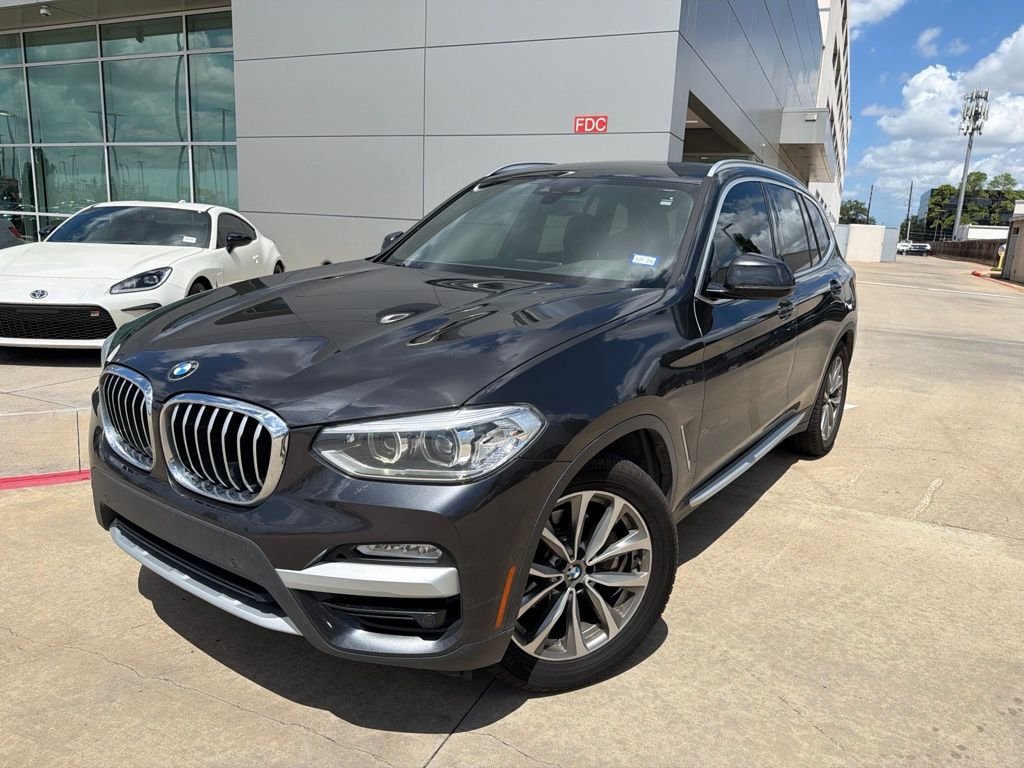 Used 2019 Dark Graphite BMW sDrive30i image 1