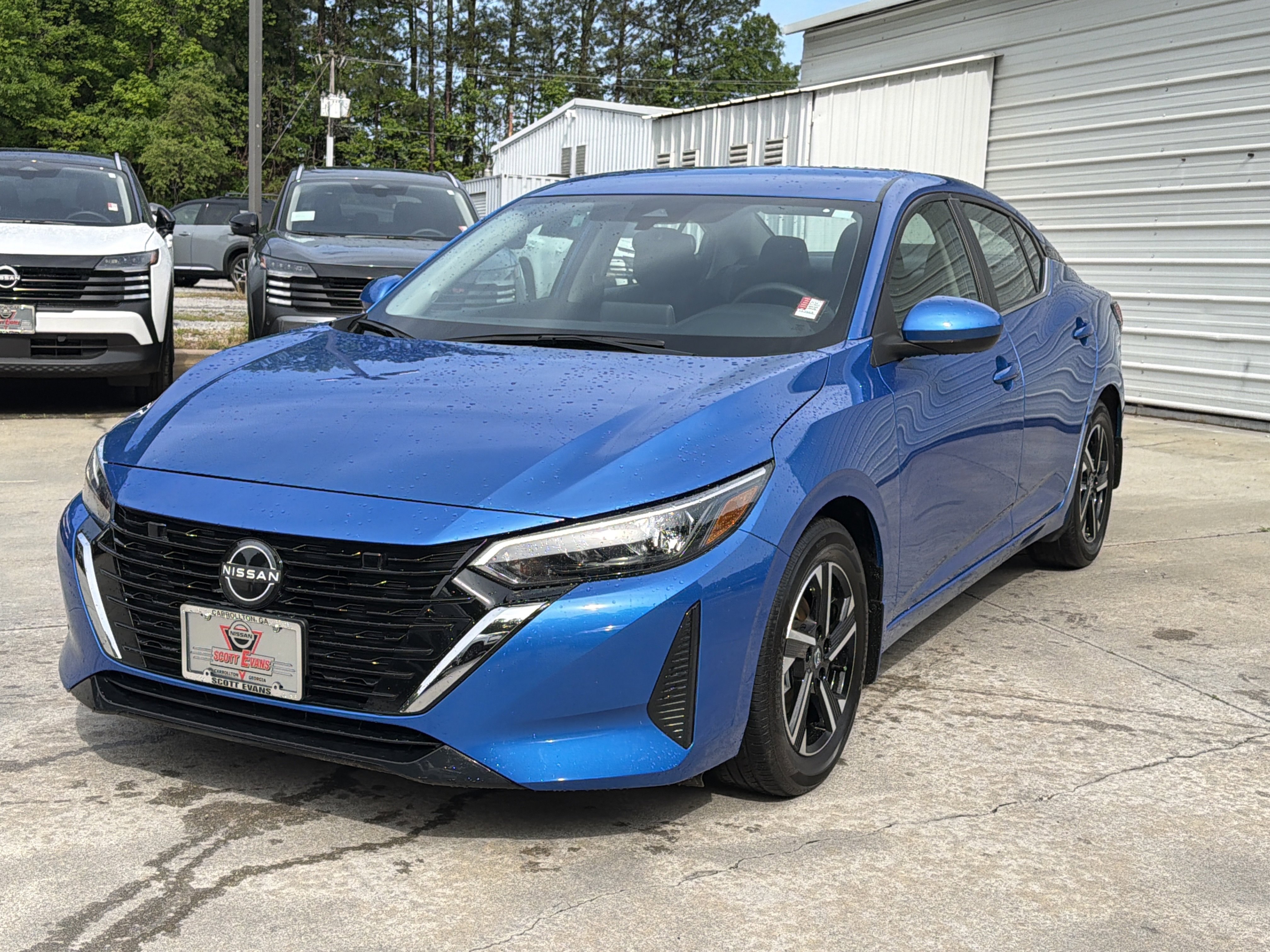 Used 2025 Electric Blue Metallic Nissan SV image 4
