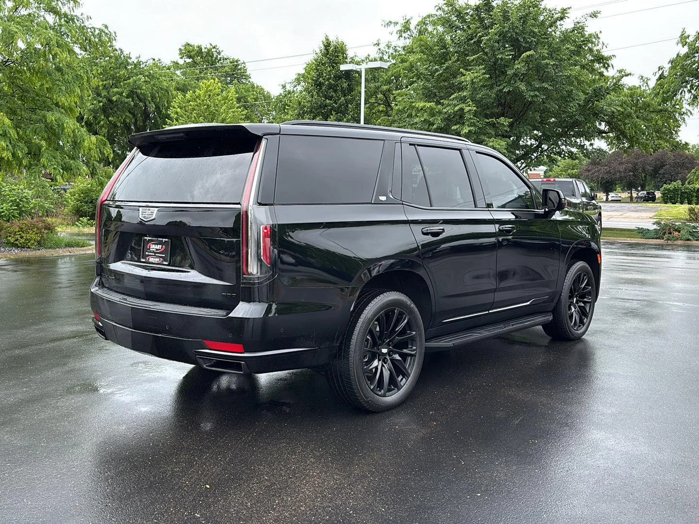 Used 2024 Black Raven Cadillac 4WD Sport image 11