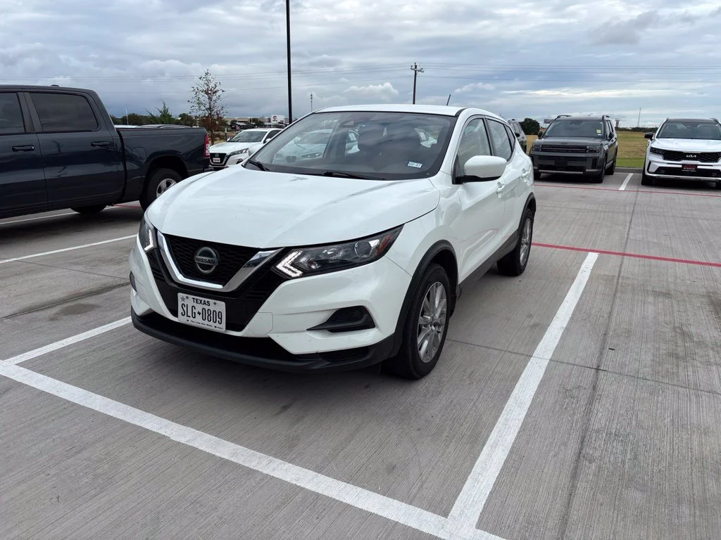 Used 2021 White Nissan S image 1