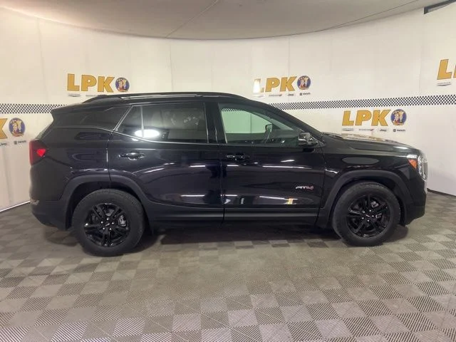 Used 2024 Ebony Twilight Metallic GMC AT4 image 2