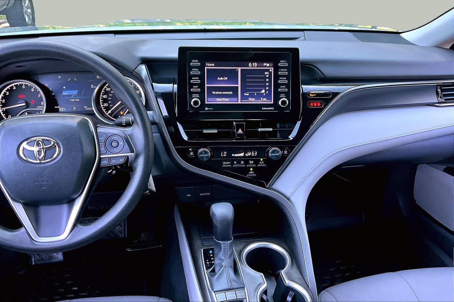 Used 2023 Celestial Silver Metallic Toyota LE image 7