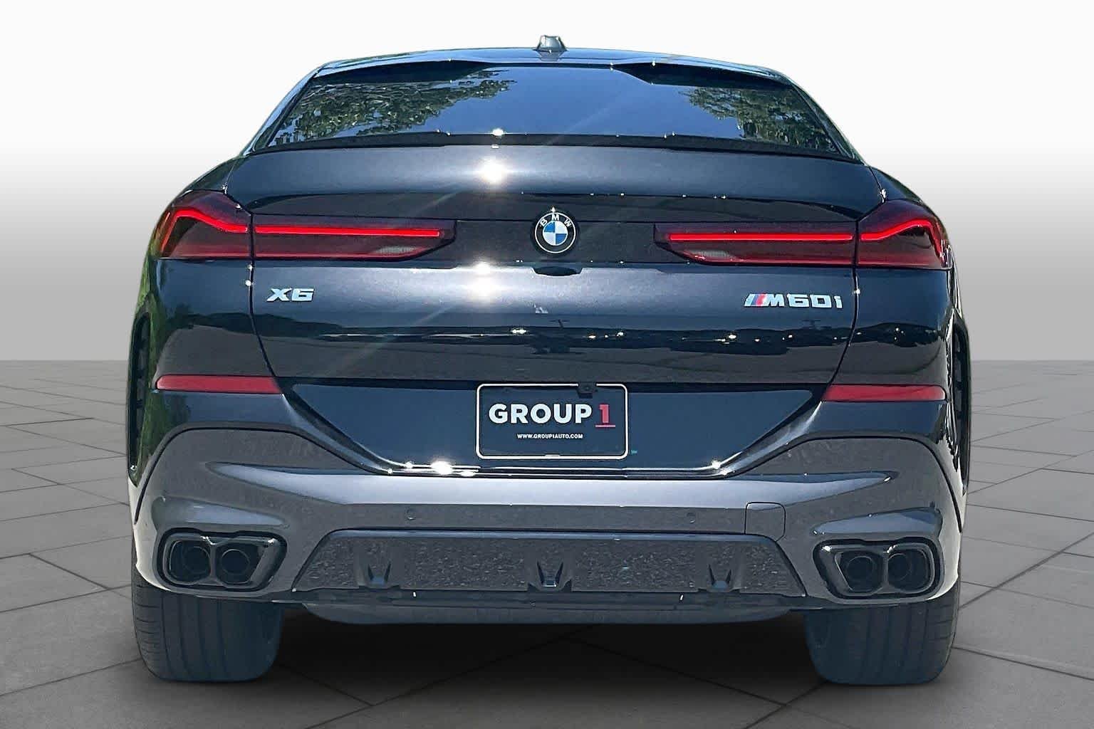 Used 2027 Black Sapphire Metallic BMW M60i image 4