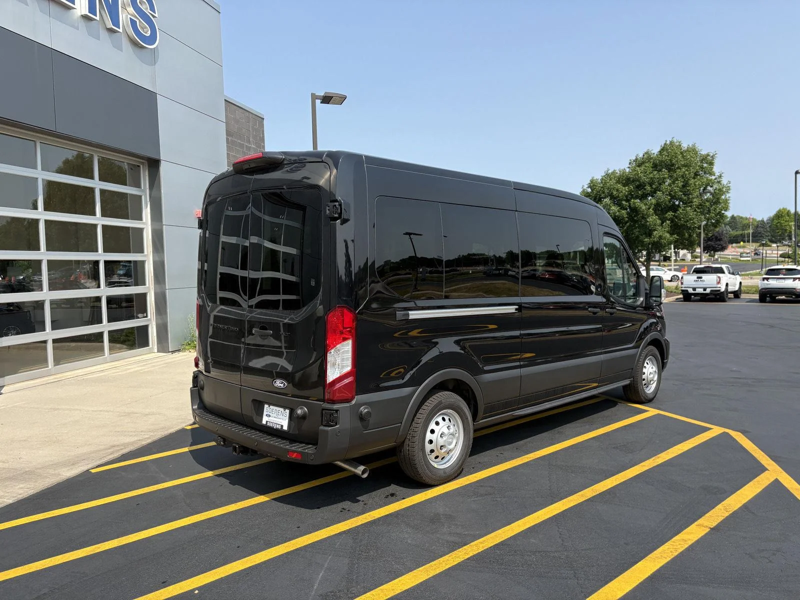 New 2026 Agate Black Metallic Ford Passenger Van XLT image 6
