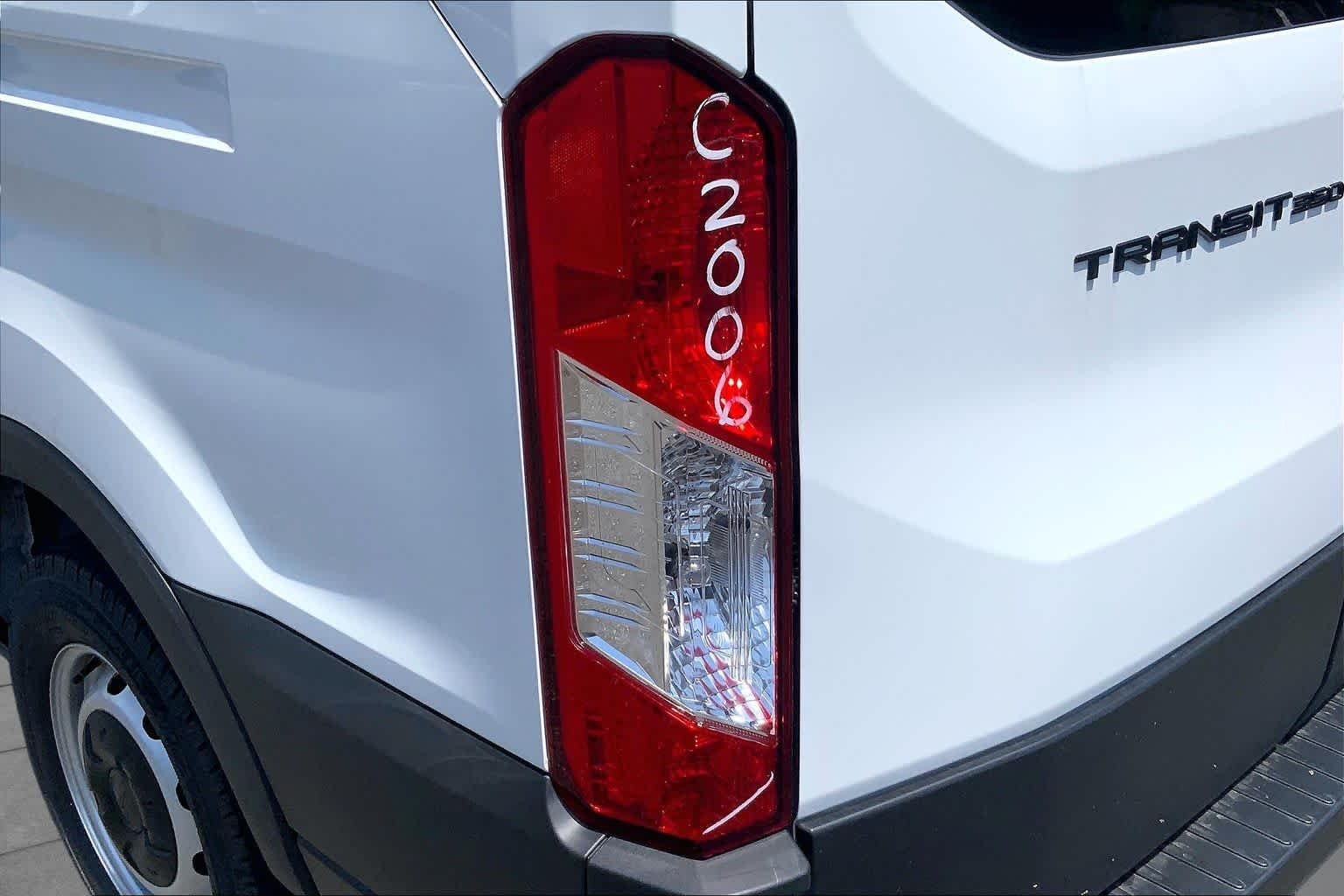 New 2026 Oxford White Ford Passenger Van XL image 14