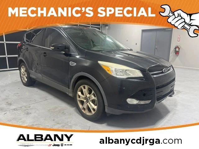 Used 2015 Black Ford Titanium image 1