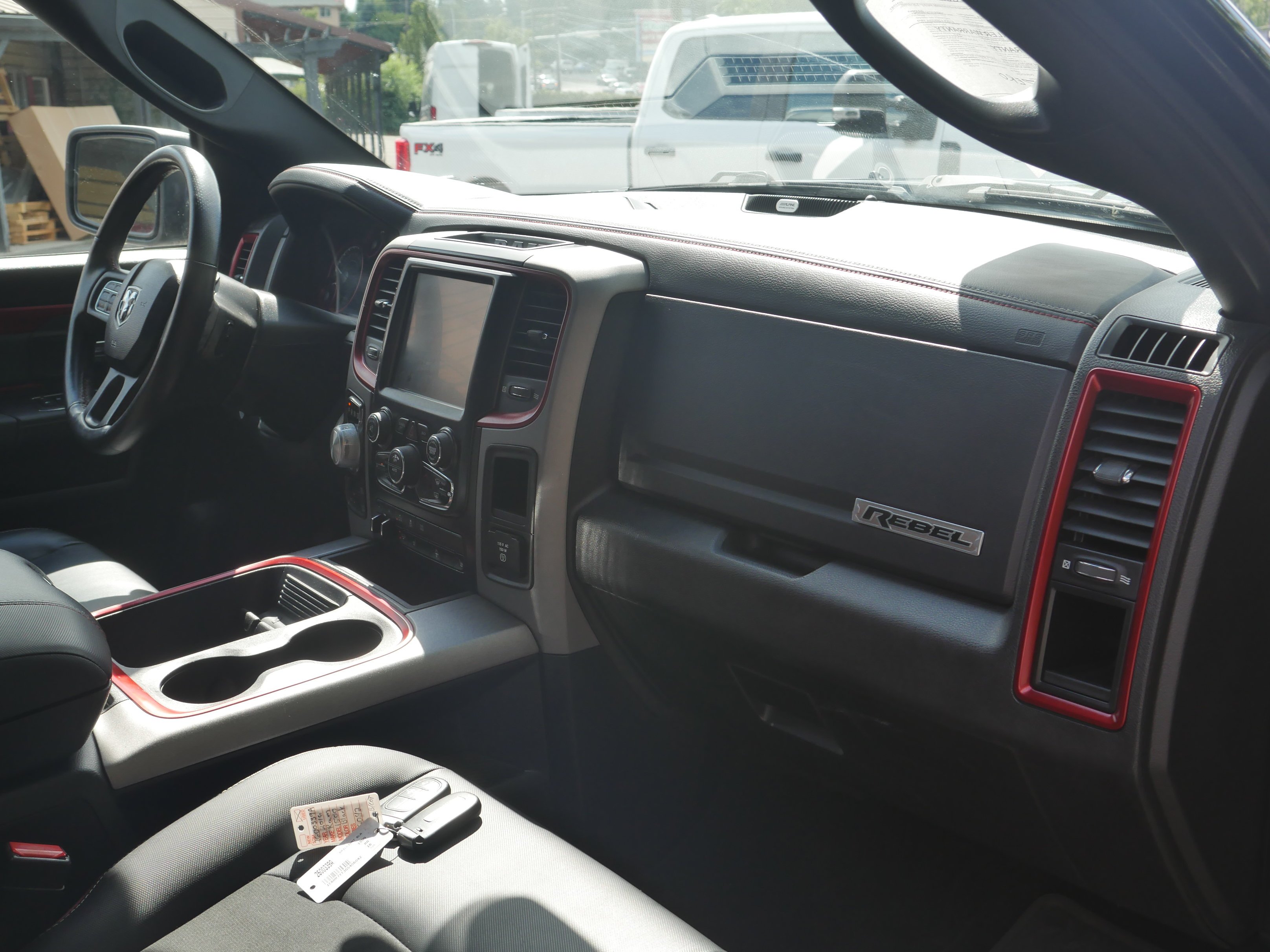 Used 2016 Brilliant Black Crystal Pearlcoat Ram Rebel image 28