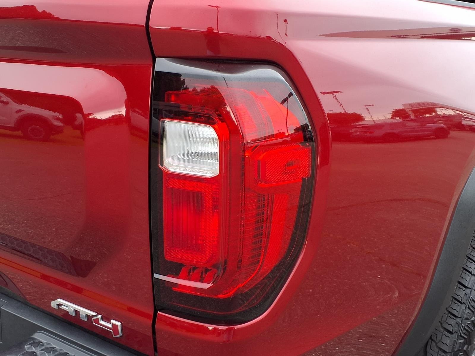 Used 2025 Volcanic Red Tintcoat GMC 4WD AT4 image 18