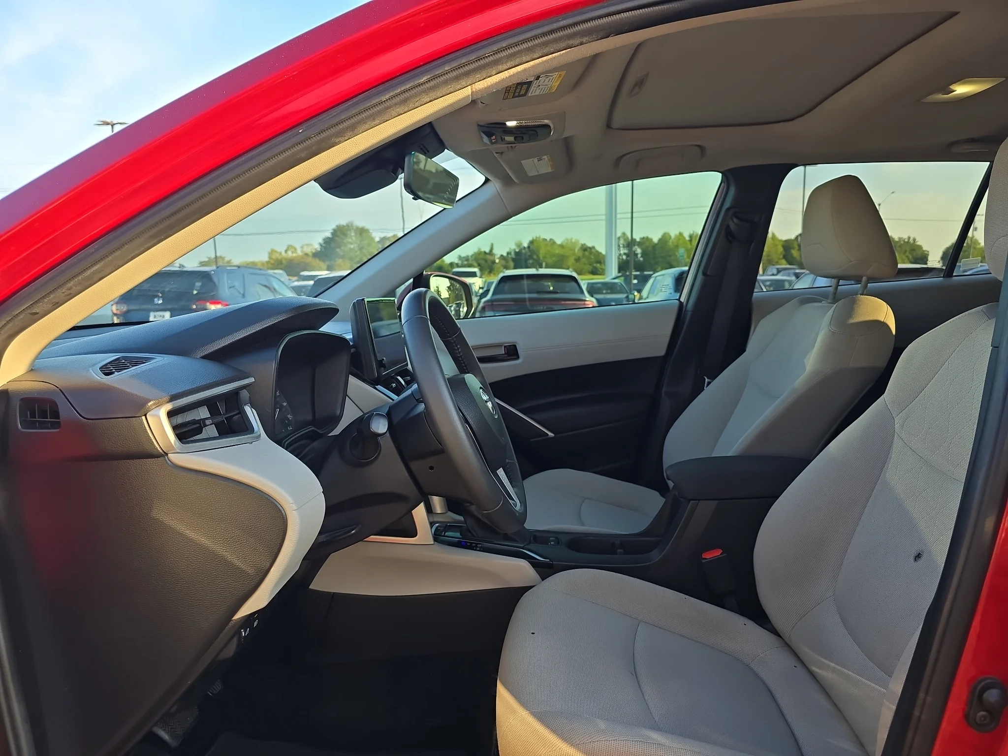 Used 2024 Barcelona Red Metallic Toyota LE image 7