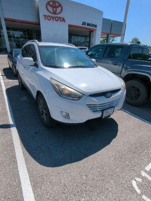 Used 2014 Hyundai Tucson SE with VIN KM8JUCAG7EU934285 for sale in Columbia, MO