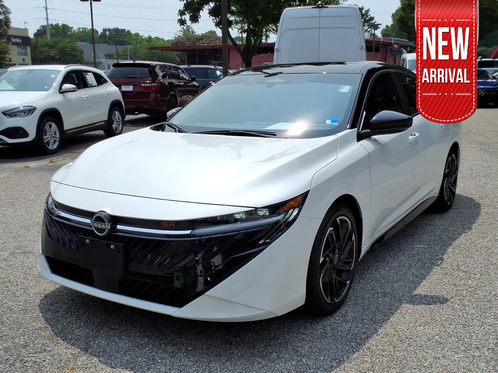 Used 2026 Aspen White Tricoat/Super Black Nissan SR image 1