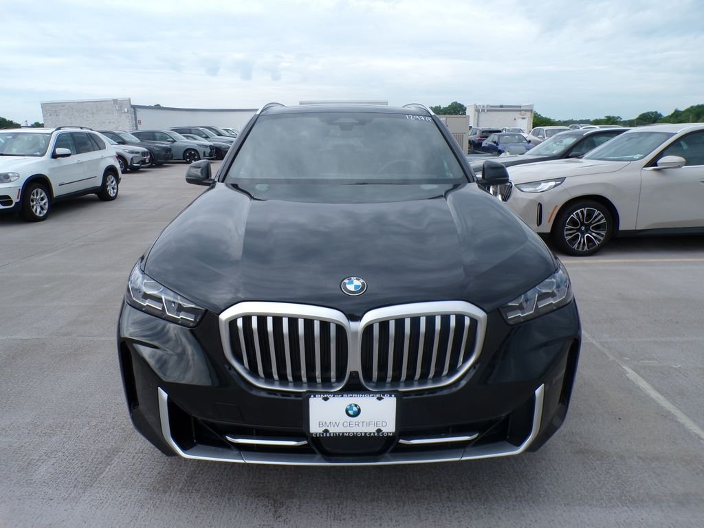Certified Used 2024 Black Sapphire Metallic BMW xDrive40i image 2
