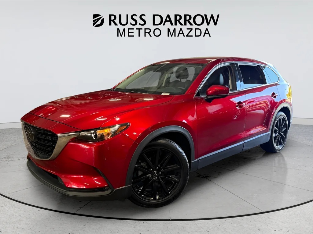 Used 2023 Red Mazda Touring Plus image 1