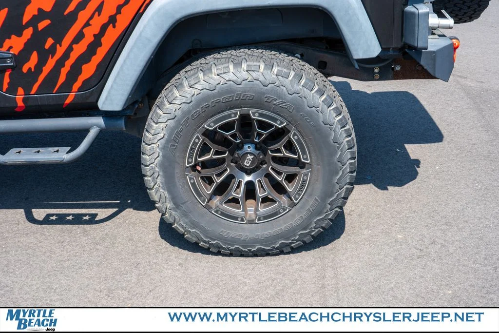 Used 2015 Black Clearcoat Jeep Unlimited Sport image 13