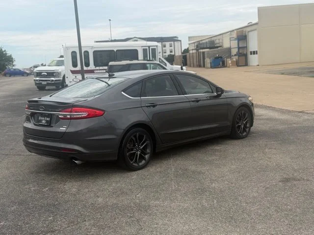 Used 2018 Magnetic Metallic Ford SE image 5