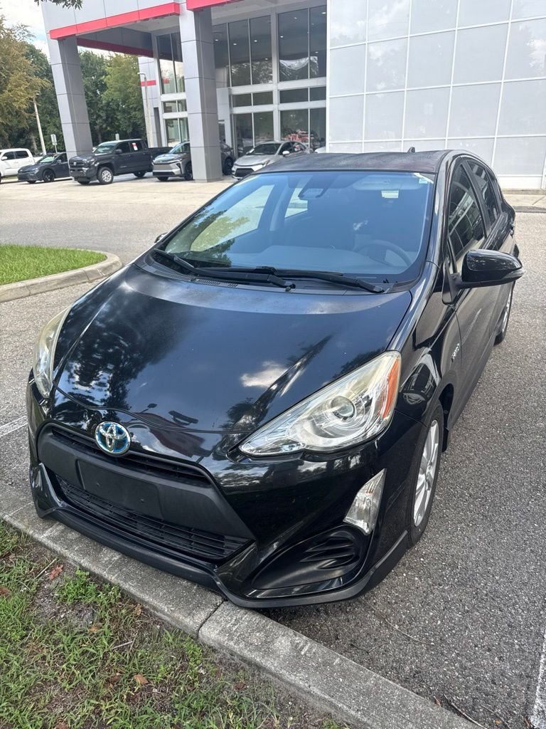 Used 2017 Black Toyota Three image 1