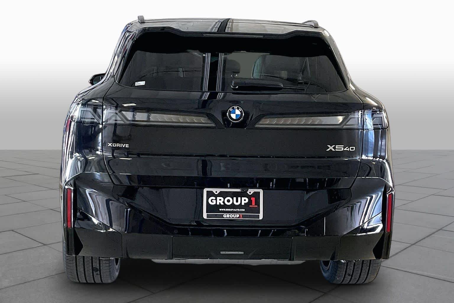 New 2027 Black Sapphire Metallic BMW 40 xDrive image 4