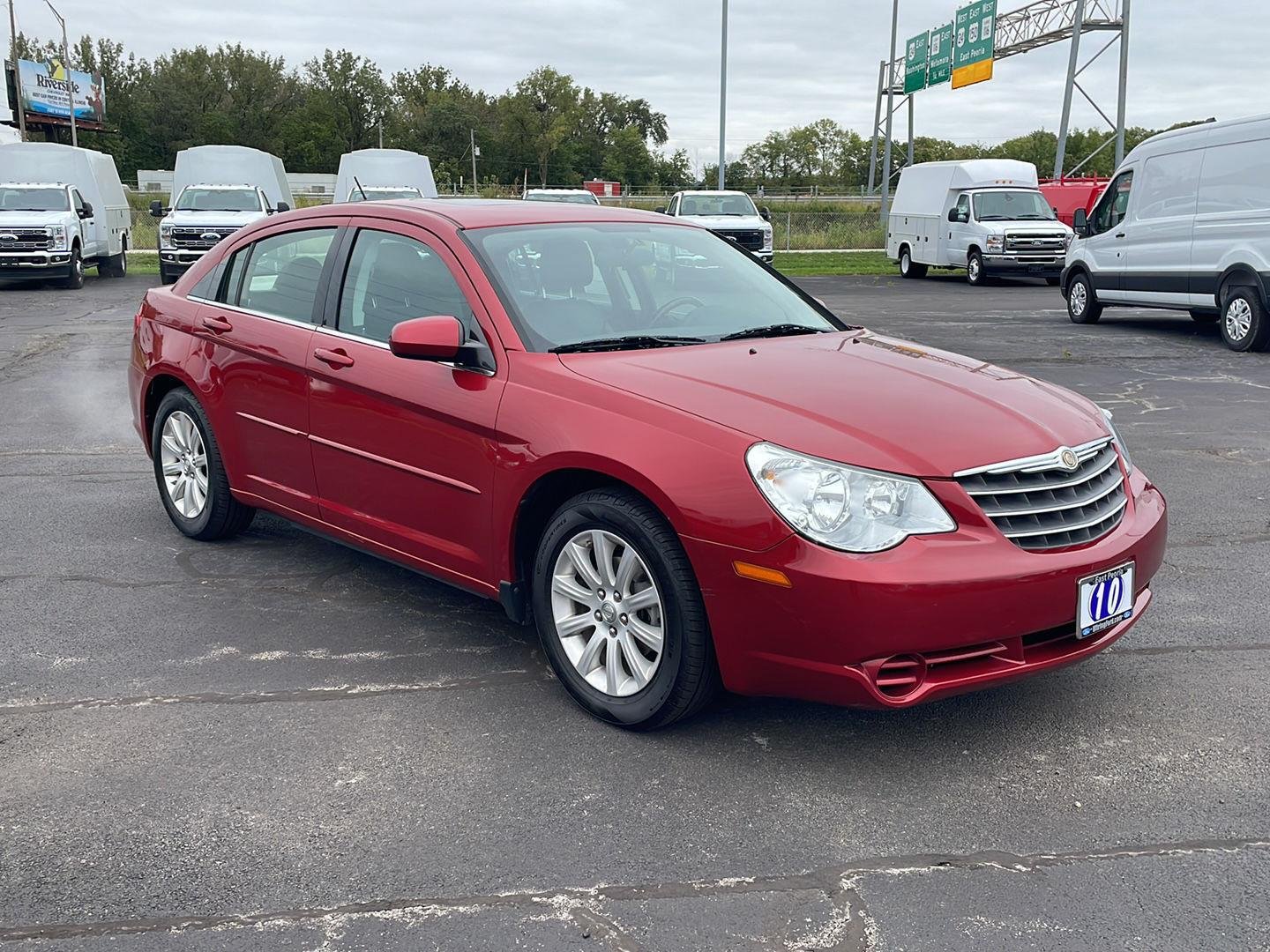 Used 2010 Inferno Red Crystal Pearl Chrysler Limited image 7