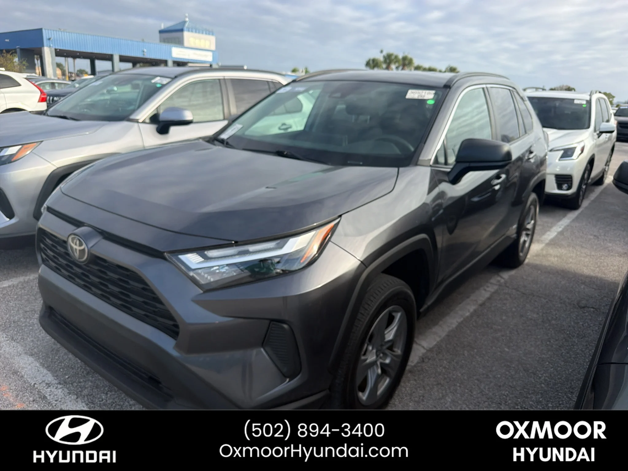Used 2025 Magnetic Gray Metallic Toyota Hybrid LE image 1