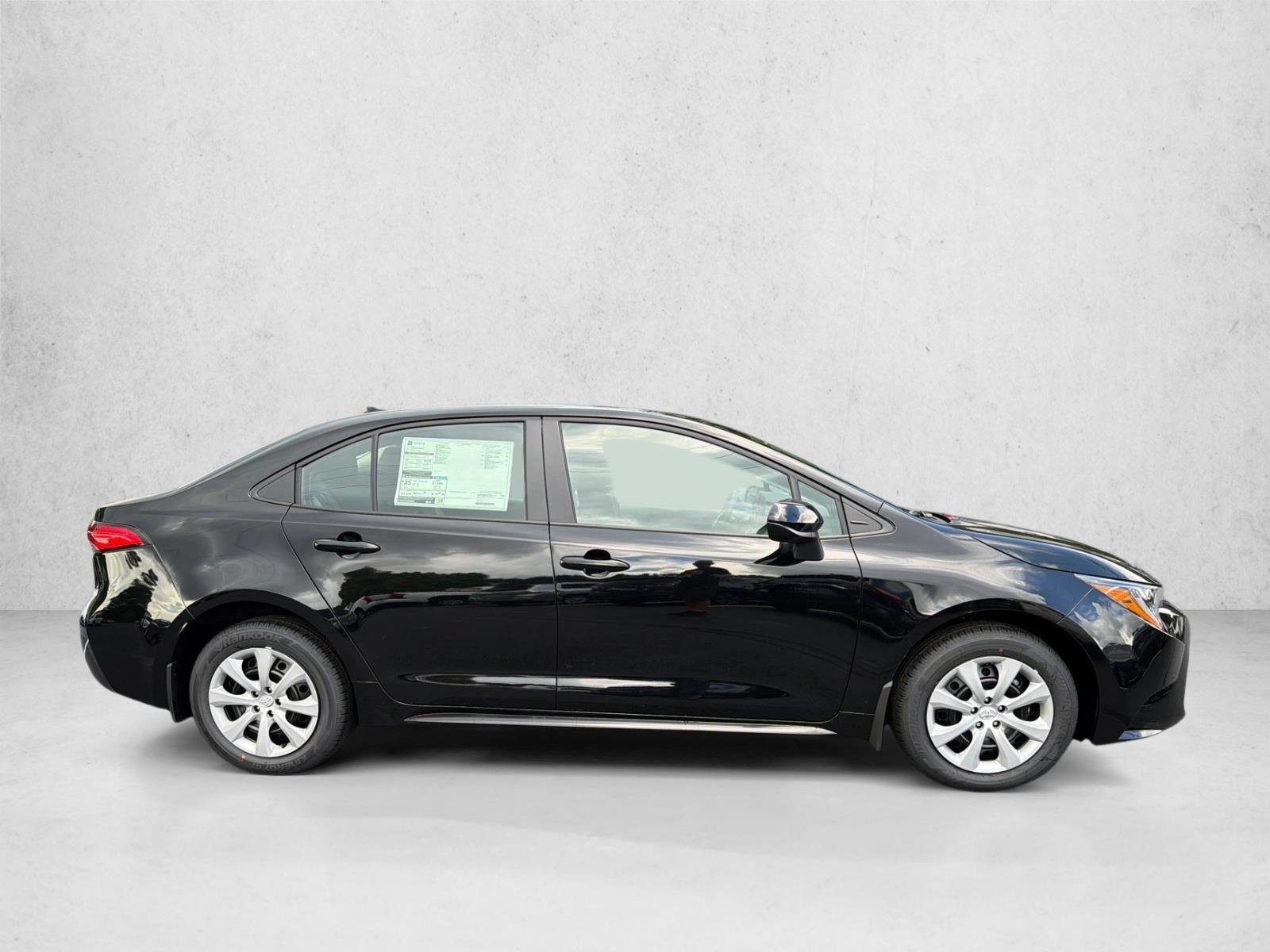 New 2026 Midnight Black Metallic Toyota LE image 2